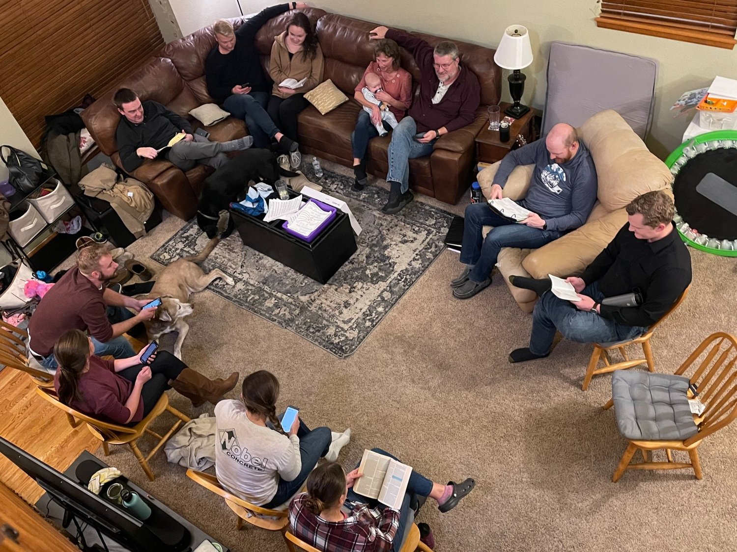 A Group of Christians meets in a home for bible study